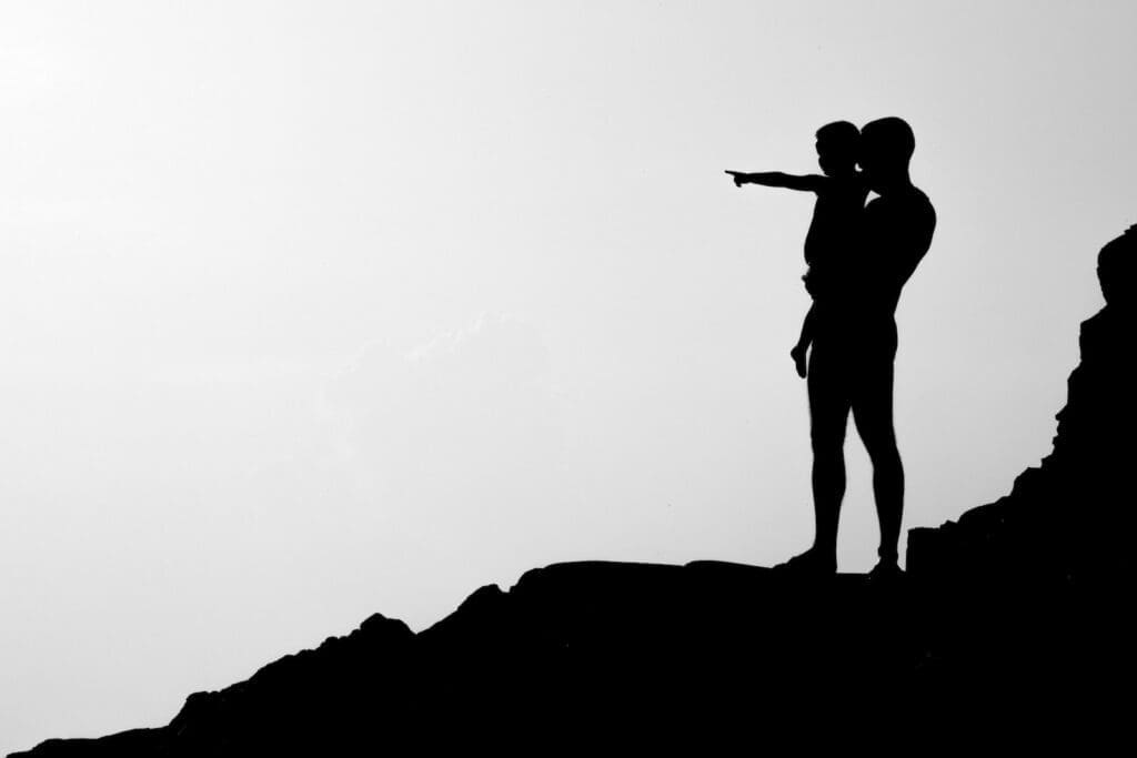 Father's Day, silhouette of man carrying child